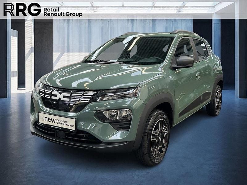 Flechtengrau Gebraucht 2023 Dacia Spring Essentiel Kleinwagen | 11.390 € (Guter Preis) - Bild 1/3