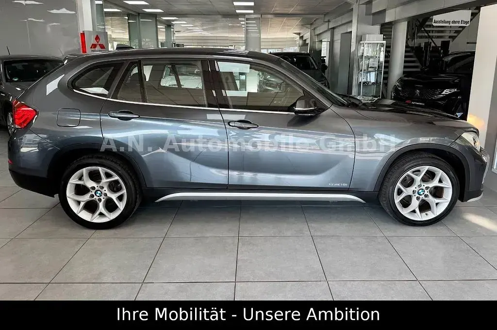Second-hand BMW X1 xLine 150 CP (110 kW) 2015 Gri SUV