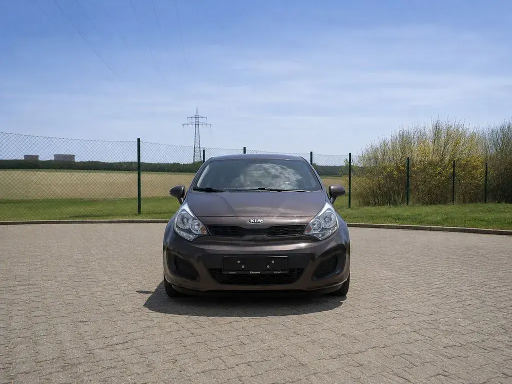 Gebraucht Kia Rio Edition 7 86 PS (63 kW) 2013 Braun Limousine