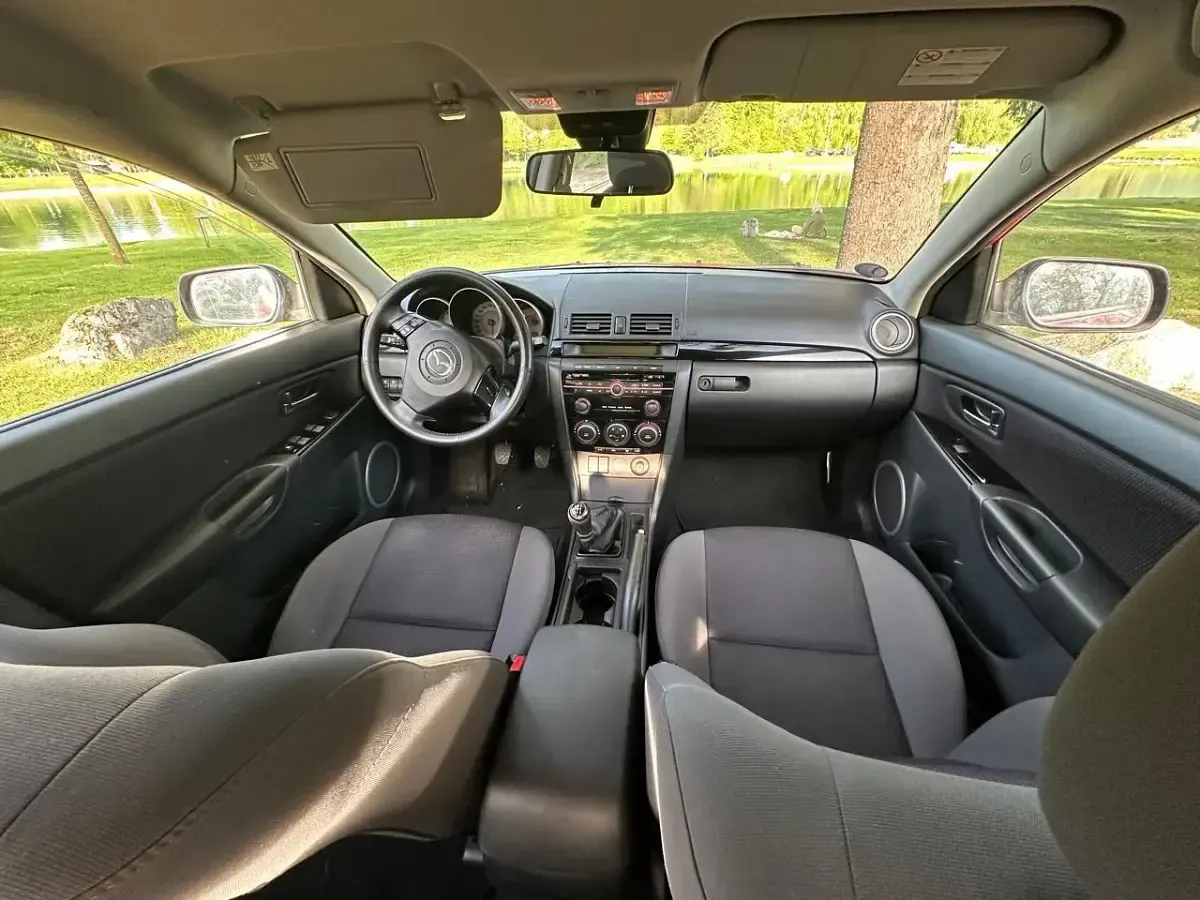Używany Mazda 3 105 KM (77 kW) 2009 Czerwony Hatchback