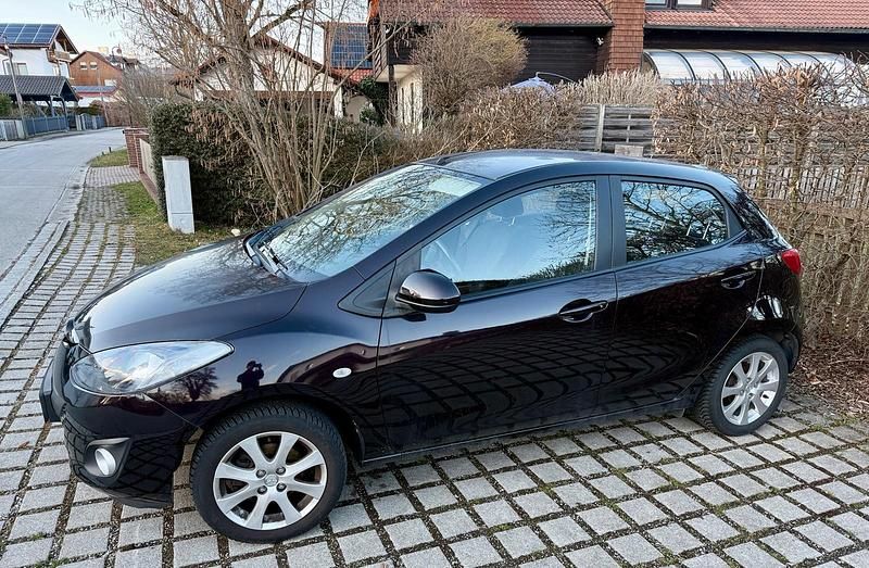 Gebraucht Mazda 2 75 PS (55 kW) 2011 Schwarz Kleinwagen
