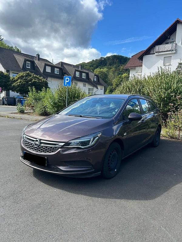 Braun Gebraucht 2016 Opel Astra Kombi | 6.490 € (Superpreis) - Bild 1/4