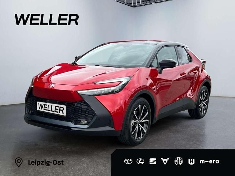 Karminarot mica / dach schwarz Neu 2025 Toyota C-HR Team SUV | 32.490 € (Guter Preis) - Bild 1/3