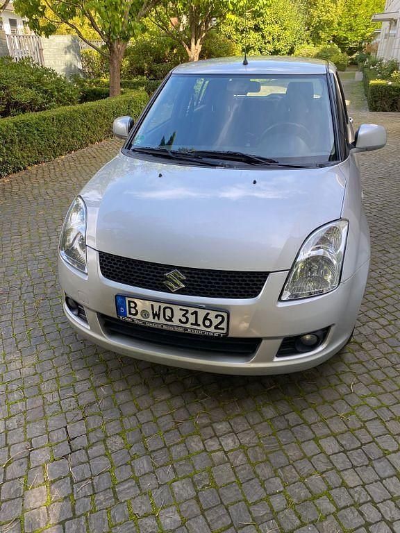 Silber Gebraucht 2009 Suzuki Swift Comfort Kleinwagen | 4.800 € (Fairer Preis) - Bild 1/4