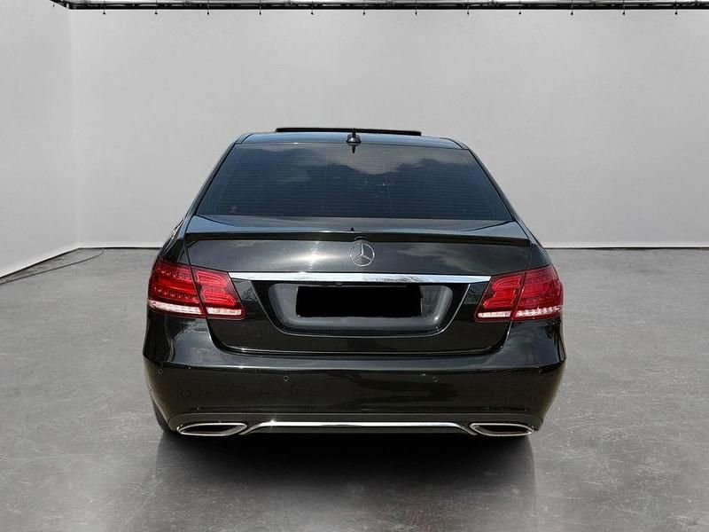 Używany Mercedes E500 408 KM (300 kW) 2014 Czarny Sedan/Limuzyna