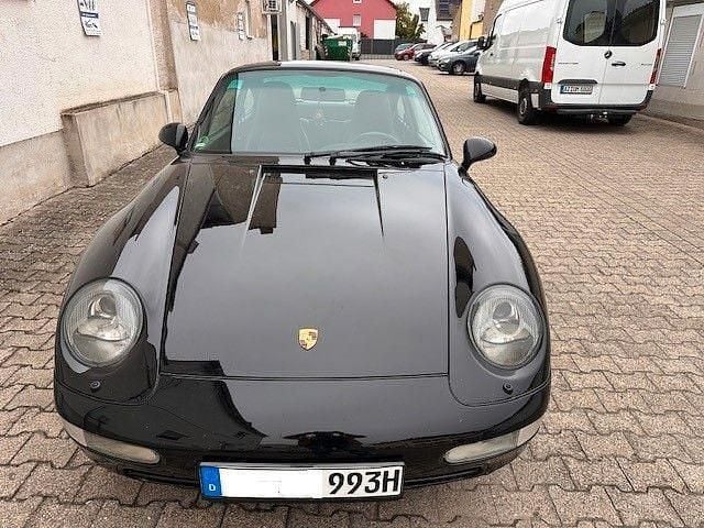 Schwarz Gebraucht 1995 Porsche 911 Carrera Coupé | 68.993 € - Bild 1/4