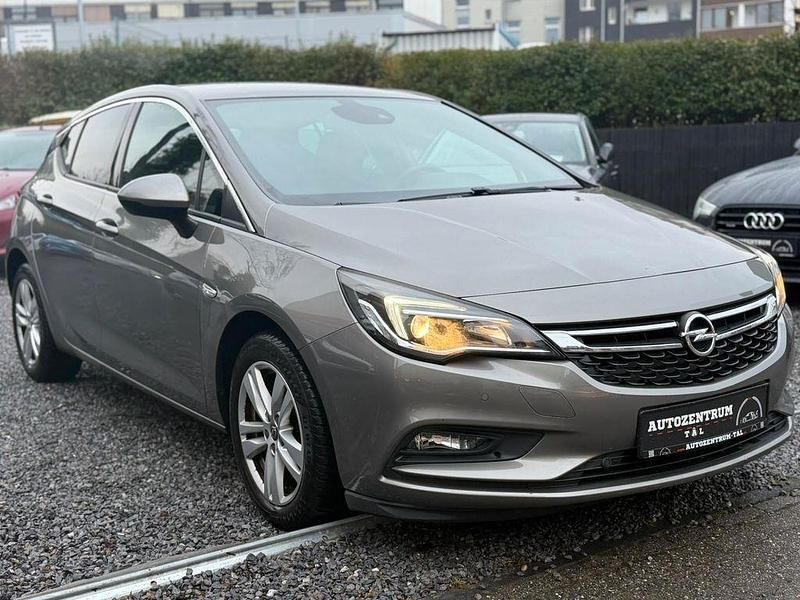Braun Gebraucht 2017 Opel Astra Dynamic Limousine | 9.990 € (Fairer Preis) - Bild 1/4