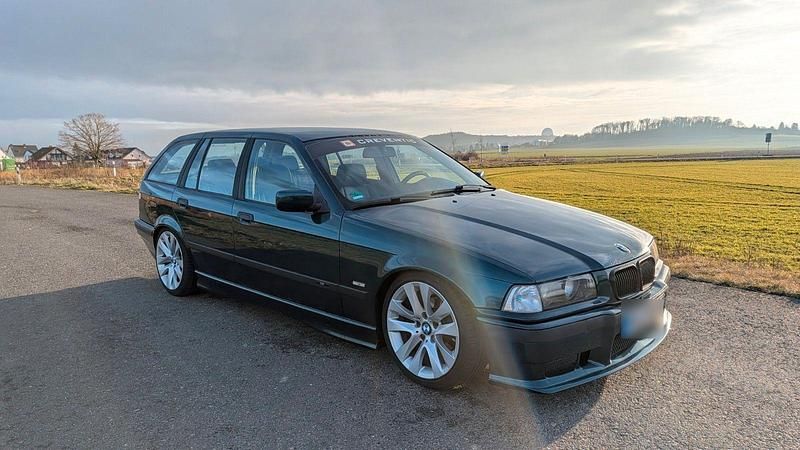 Gebraucht BMW 318 Basis 116 PS (85 kW) 1997 Grün Kombi