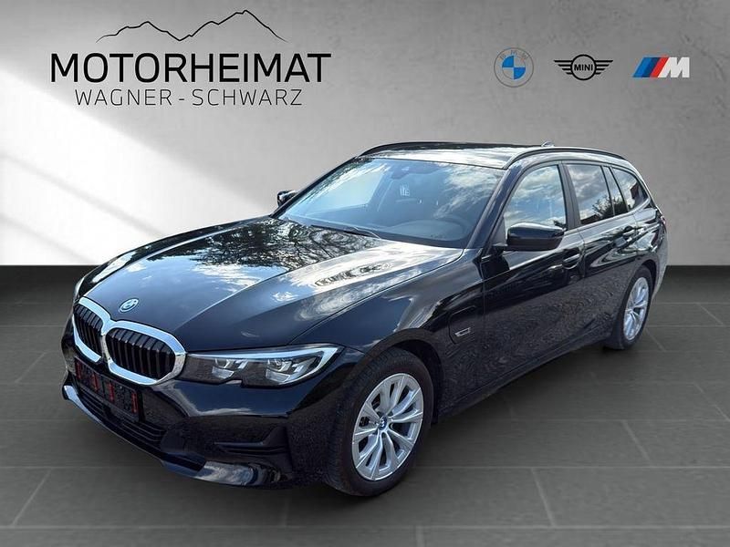 Schwarz Gebraucht 2022 BMW 320e Advantage Kombi | 26.900 € (Fairer Preis) - Bild 1/4