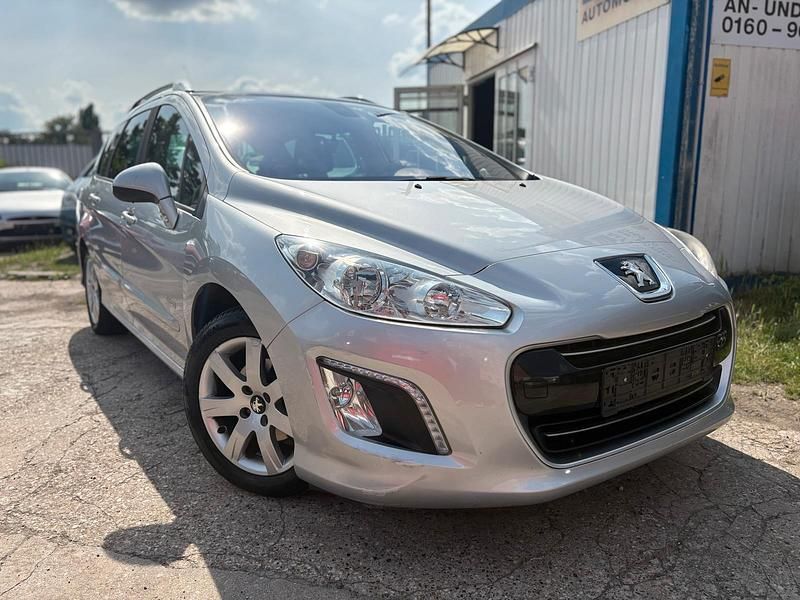 Silber Gebraucht 2013 Peugeot 308 Kombi | 4.390 € - Bild 1/4