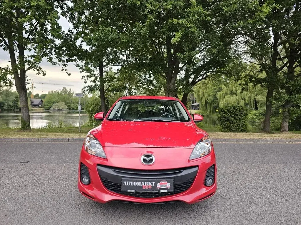 Używany Mazda 3 Edition 150 KM (110 kW) 2012 Czerwony Sedan/Limuzyna