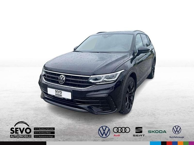 Schwarz Gebraucht 2023 VW Tiguan Allspace R-line SUV | 46.010 € (Teuer) - Bild 1/4