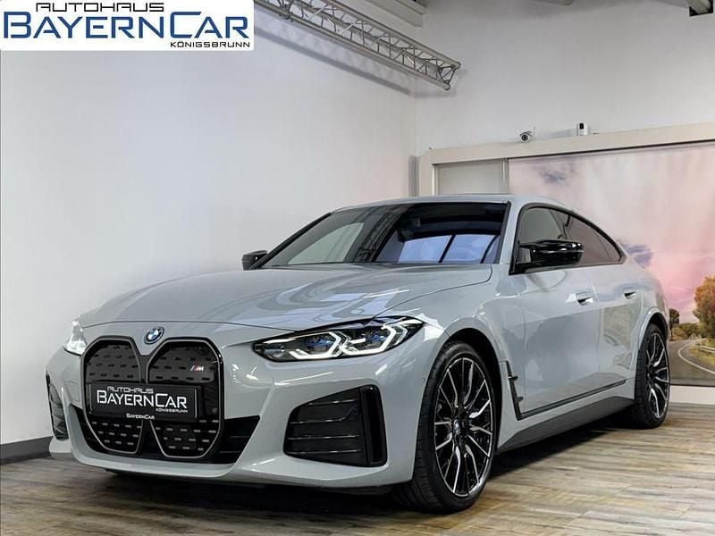 Brooklyn grau metallic Gebraucht 2024 BMW i4 Shadowline Limousine | 50.889 € (Superpreis) - Bild 1/4