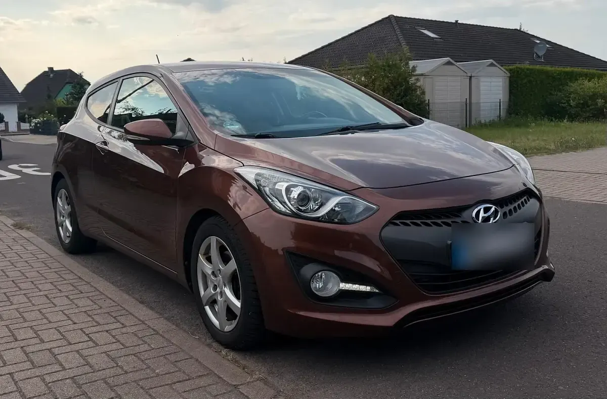 Gebraucht Hyundai i30 128 PS (94 kW) 2013 Orange Coupé