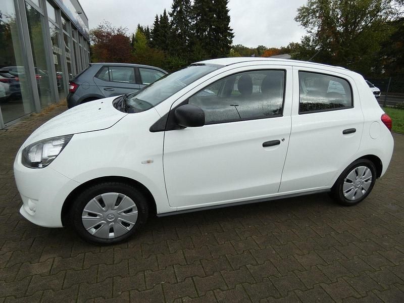 Weiß Gebraucht 2016 Mitsubishi Space Star Kleinwagen | 3.999 € (Fairer Preis) - Bild 1/4