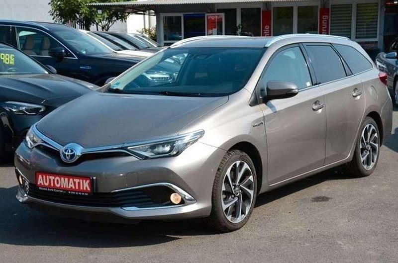 Avant garde bronze Gebraucht 2015 Toyota Auris Hybrid Sport Kombi | 15.900 € (Fairer Preis) - Bild 1/4