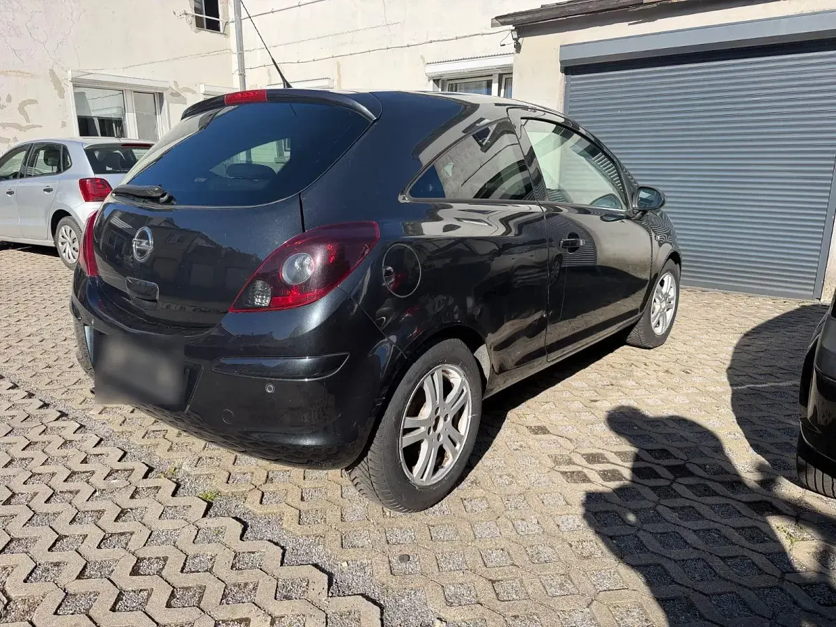 Gebraucht Opel Corsa 101 PS (74 kW) 2012 Schwarz Kleinwagen