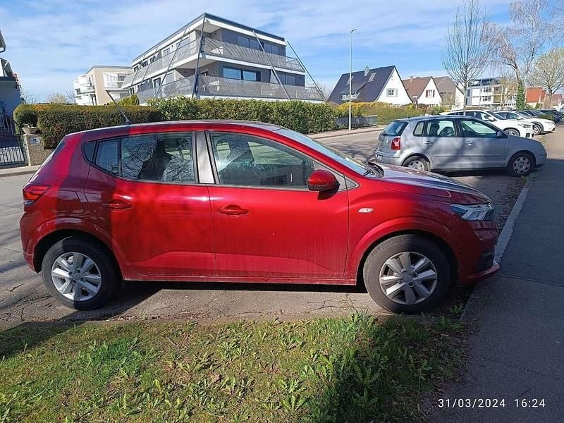 Rot Gebraucht 2023 Dacia Sandero Expression Kleinwagen | 13.500 € (Superpreis) - Bild 1/4