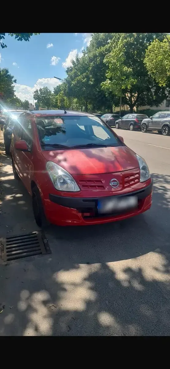 Gebraucht Nissan Pixo 68 PS (50 kW) 2009 Rot Kleinwagen