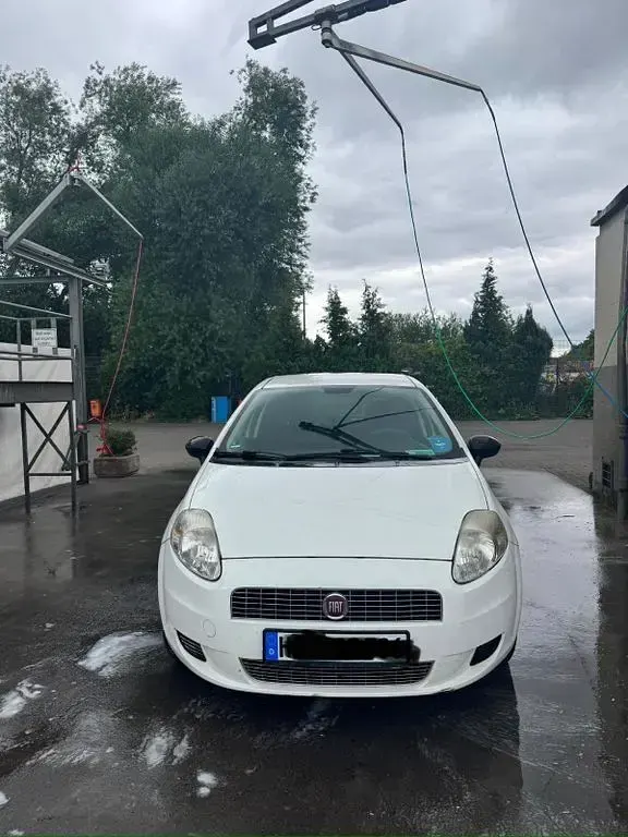 Gebraucht Fiat Grande Punto 77 PS (56 kW) 2009 Weiß Kleinwagen
