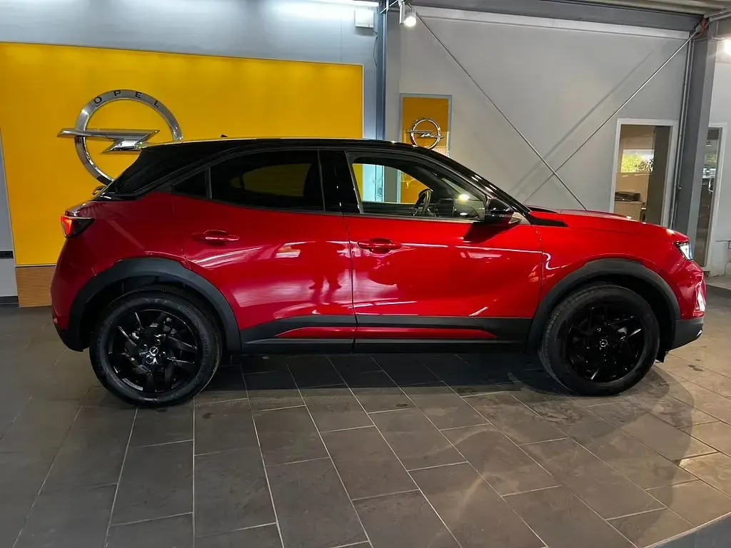 Używany Opel Mokka-e 100 kW (136 KM) 2024 Czerwony SUV