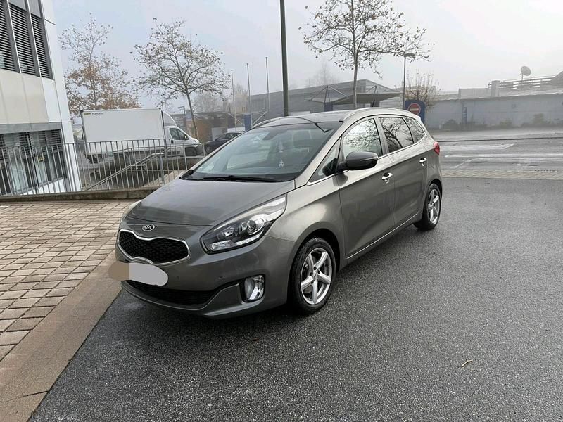 Grau Gebraucht 2014 Kia Carens Spirit Van / Kleinbus | 8.500 € (Fairer Preis) - Bild 1/4