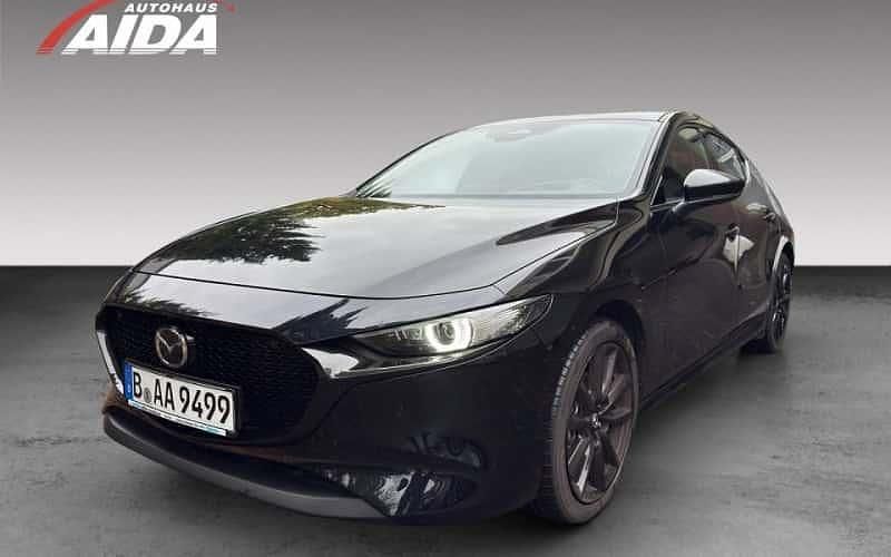 Jet black metallic Gebraucht 2024 Mazda 3 Exclusive-Line Limousine | 32.450 € (Teuer) - Bild 1/4