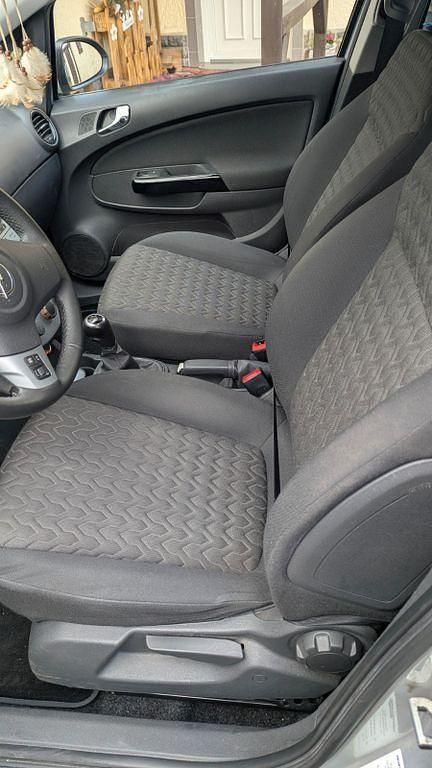 Gebraucht Opel Corsa Active 87 PS (63 kW) 2013 Silber Kleinwagen