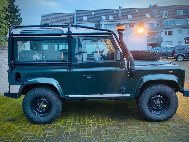 Grün Gebraucht 2003 Land Rover Defender SUV | 35.000 € - Bild 1/4