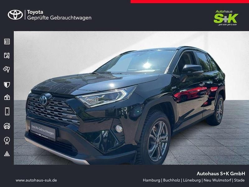 Tiefschwarz mica met (schwarz) Gebraucht 2018 Toyota RAV4 Hybrid Lounge SUV | 29.490 € (Fairer Preis) - Bild 1/4