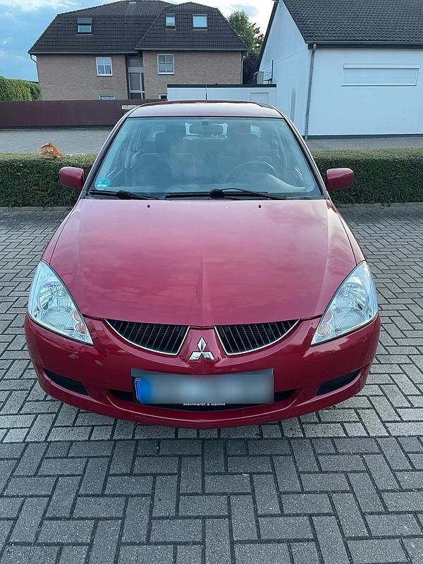 Gebraucht Mitsubishi Lancer 98 PS (72 kW) 2003 Rot Limousine