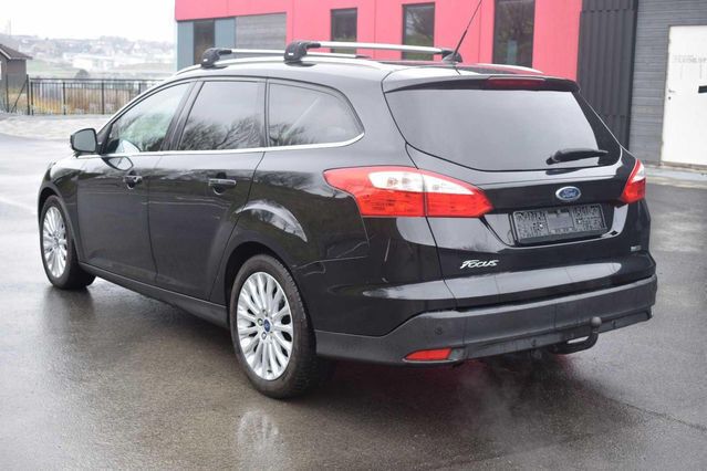Schwarz metallic Gebraucht 2013 Ford Focus Titanium X Kombi | 7.500 € - Bild 1/4