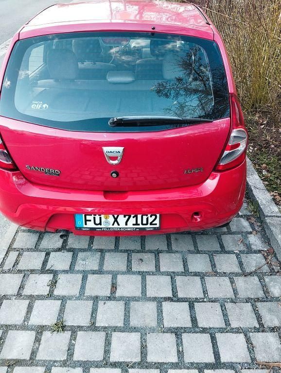 Second-hand Dacia Sandero 75 CP (55 kW) 2009 Roșu Berlinǎ