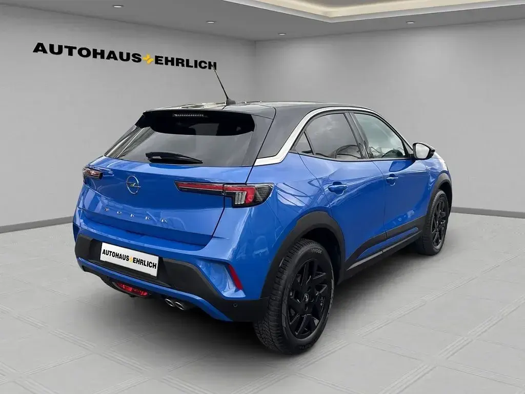 Gebraucht Opel Mokka Business Elegance 131 PS (96 kW) 2023 Perl blau/voltaik blau SUV