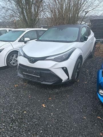 Gebraucht Toyota C-HR Basis 184 PS (135 kW) 2023 Platinumweiß perleffekt/ dach schwarz SUV