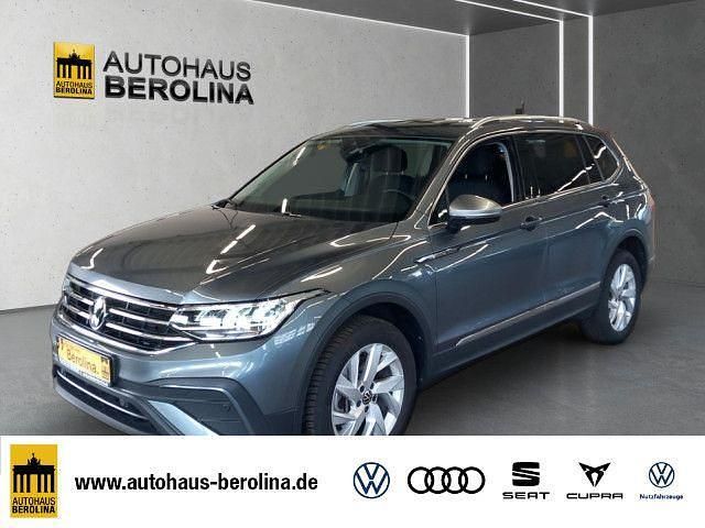 Grau Gebraucht 2024 VW Tiguan Allspace Life SUV | 38.888 € (Superpreis) - Bild 1/4
