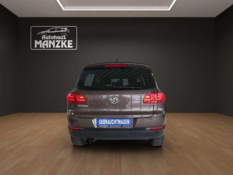 Gebraucht VW Tiguan Cup 160 PS (117 kW) 2014 Toffeebraun metallic SUV