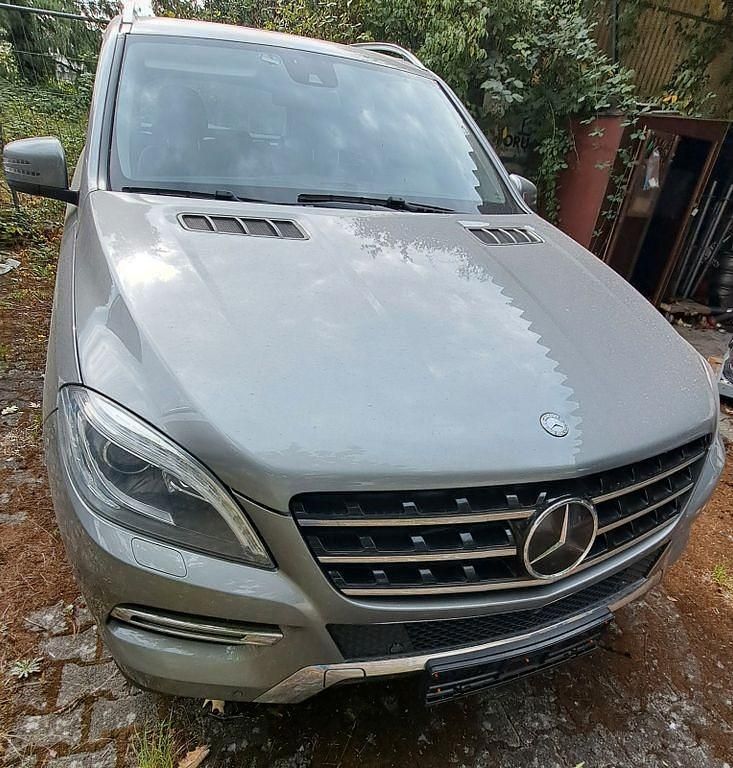 Grau Gebraucht 2014 Mercedes ML350 SUV | 12.700 € - Bild 1/4