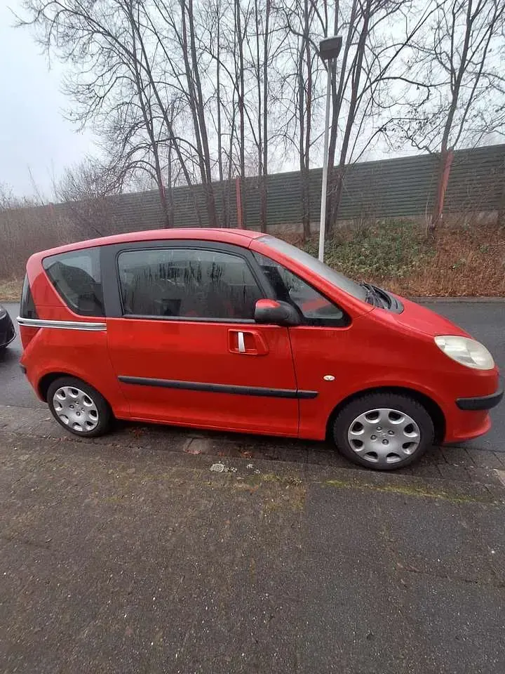 Gebraucht Peugeot 1007 Premium 73 PS (53 kW) 2006 Rot Van / Kleinbus