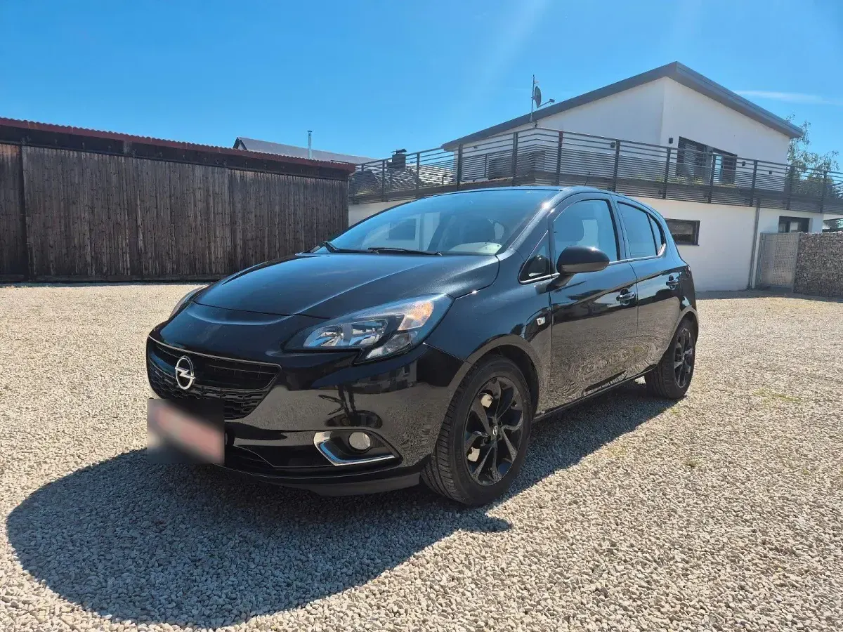 Używany Opel Corsa 101 KM (74 kW) 2015 Czarny Hatchback