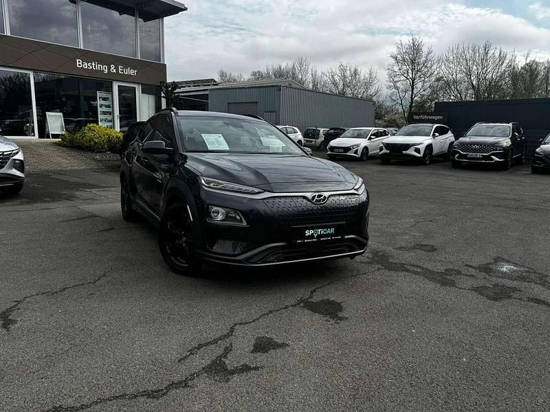 Dark knight / mic Gebraucht 2021 Hyundai Kona Premium SUV | 20.900 € (Fairer Preis) - Bild 1/4
