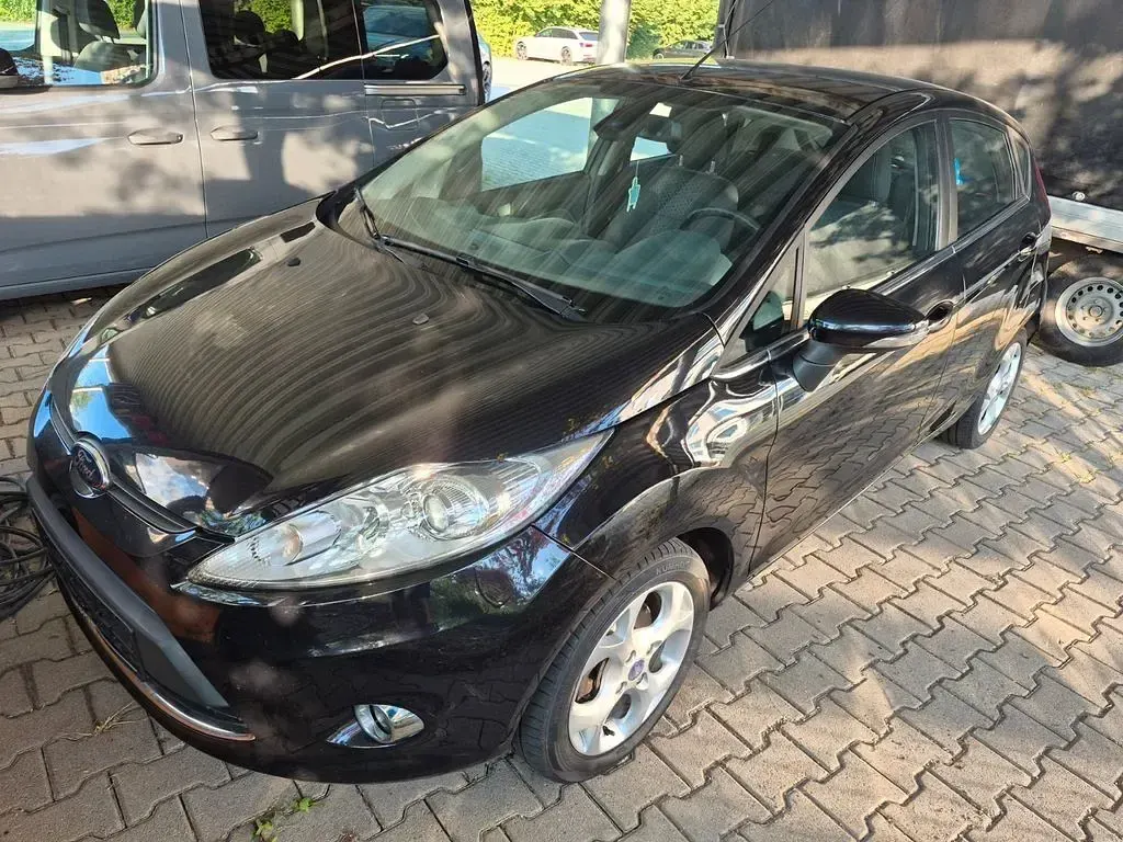Gebraucht Ford Fiesta 82 PS (60 kW) 2011 Schwarz Limousine