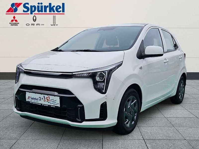 Ud) schneeweiss (weiss Gebraucht 2024 Kia Picanto Vision Kleinwagen | 15.480 € (Fairer Preis) - Bild 1/3