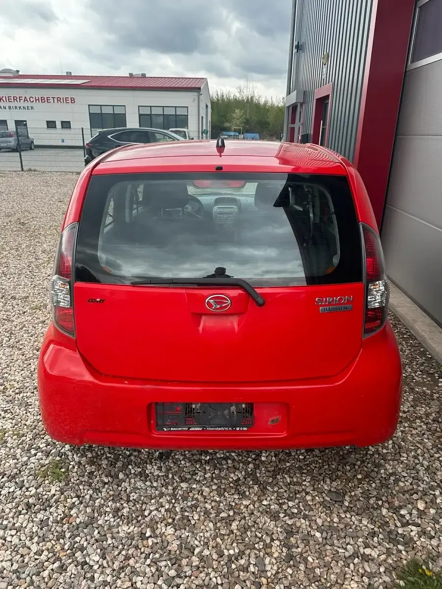 Gebraucht Daihatsu Sirion 69 PS (50 kW) 2009 Rot Kleinwagen