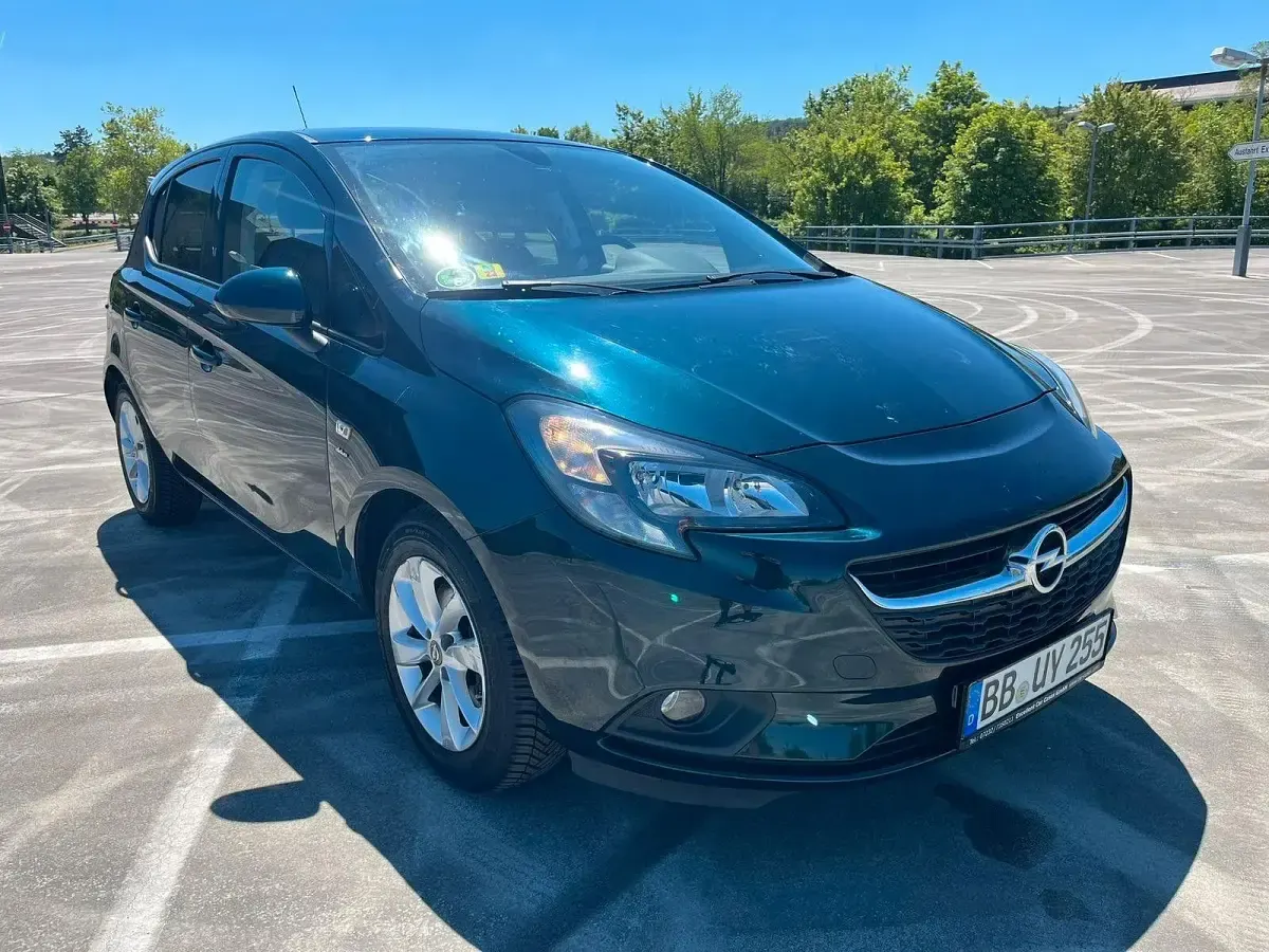 Gebraucht Opel Corsa drive 101 PS (74 kW) 2016 Grün Kleinwagen