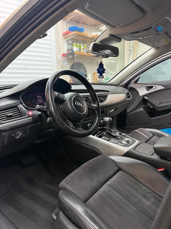 Używany Audi A6 201 KM (147 kW) 2014 Czarny Kombi