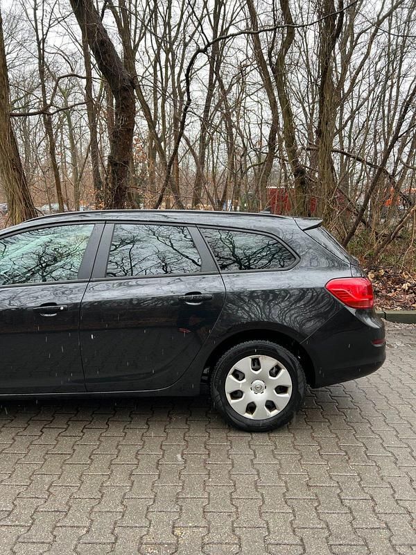 Gebraucht Opel Astra 125 PS (91 kW) 2012 Schwarz Kombi