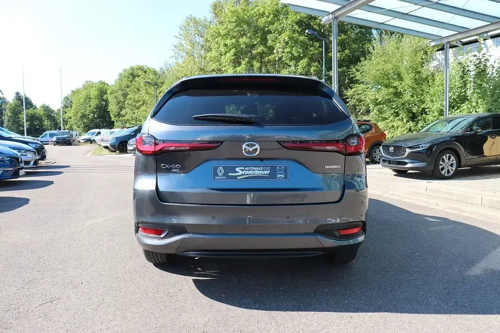 Neu Mazda CX-80 Homura-Line 254 PS (186 kW) 2026 Machine grey SUV