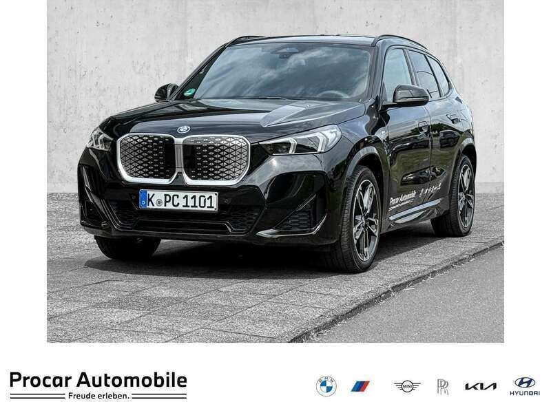 Schwarz Gebraucht 2025 BMW iX1 M Sport SUV | 50.990 € (Teuer) - Bild 1/4