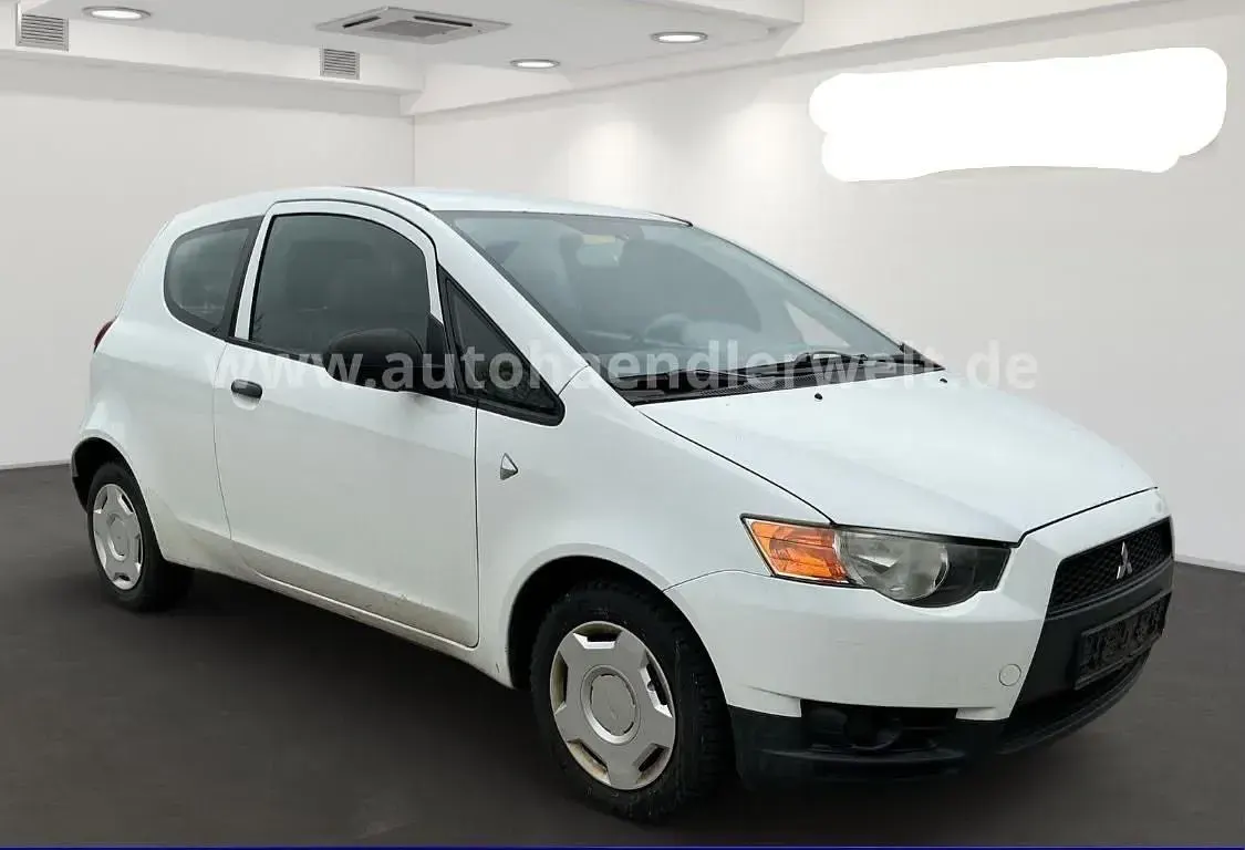Gebraucht Mitsubishi Colt 75 PS (55 kW) 2008 Weiß Kleinwagen